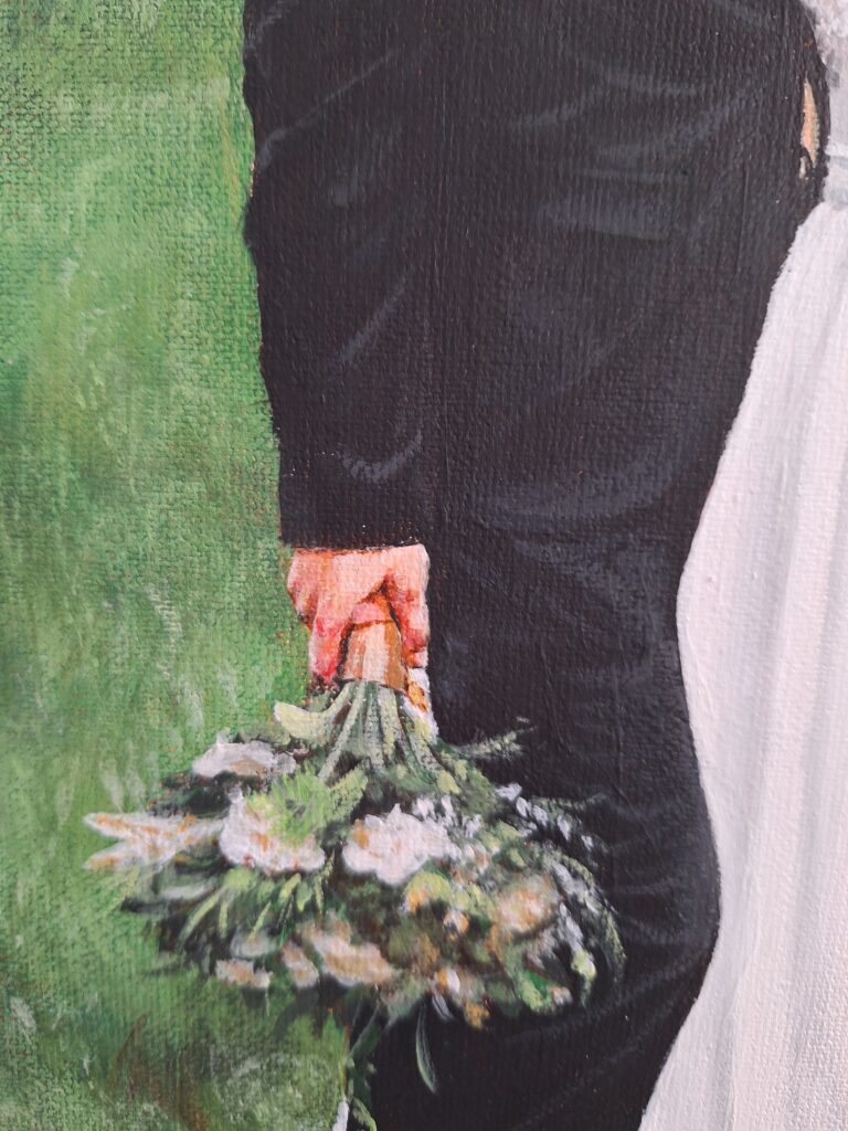 A & J - Details of groom's hand and bouquet