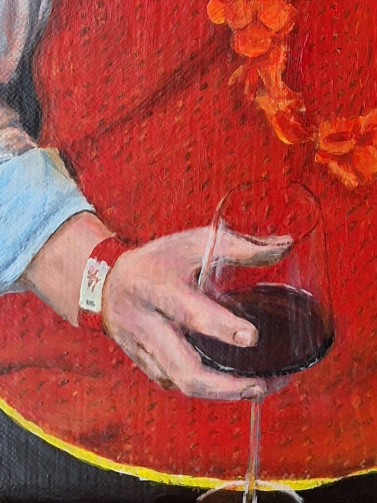 Koningsdag - detail of wine glass and hand